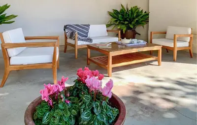 a living room with a couch and a table at Maison De Charme in Jonquerettes