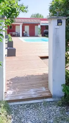 a wooden deck in front of a house at Tiny house Cécile en Avignon in Avignon