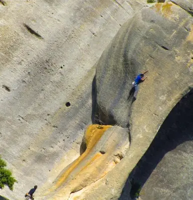 two people are walking on rocks in the street at Charming house, Lubéron, near golf and wineries in Pierrevert