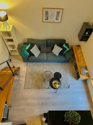 an overhead view of a living room with a couch at Perle Aix en Provence centre ville in Aix-en-Provence