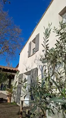 a view from a window with a view of a tree at Ginette et Marcel la maison in Saint-Rémy-de-Provence