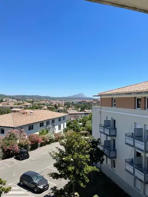 a view from the balcony of a apartment building at Charmant appartement hotel calme à Aix en Provence in Aix-en-Provence