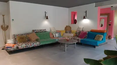 a living room with a couch and two chairs and a table at Villa 5 étoiles, 6 personnes in LʼIsle-sur-la-Sorgue