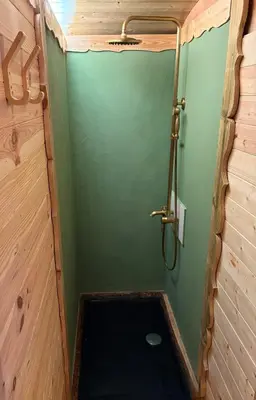 a small bathroom with a shower with a toilet at Chicken roulotte des 3 cèdres in Cavaillon