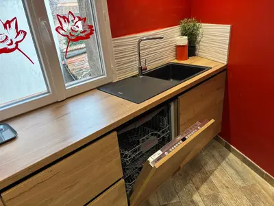a kitchen with a sink and a dishwasher at Appartement Lotus Rouge, 2 chambres, proche Mairie in Aix-en-Provence