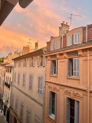 a group of buildings in a city at sunset at T2 spacieux en hyper centre pour 1 à 5 personnes in Aix-en-Provence