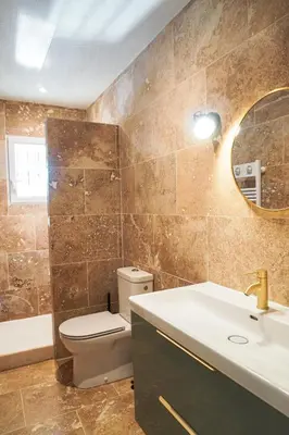 a bathroom with a toilet and a sink and a mirror at La Maison Duplex 3 Chambres - Gîte La Bergerie du Ventoux in Mormoiron