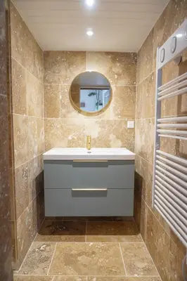 a bathroom with a sink and a mirror at La Maison Duplex 3 Chambres - Gîte La Bergerie du Ventoux in Mormoiron