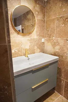 a bathroom with a sink and a mirror at La Maison Duplex 3 Chambres - Gîte La Bergerie du Ventoux in Mormoiron