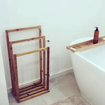 a bathroom with a toilet and a wooden shelf at Superbe mas provençal avec piscine dans le Luberon in Lagnes