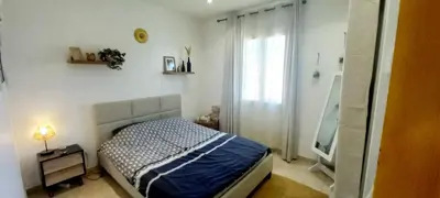 a bedroom with a bed and a television in it at Le Colibri Très belle maison près d'Avignon in Carpentras