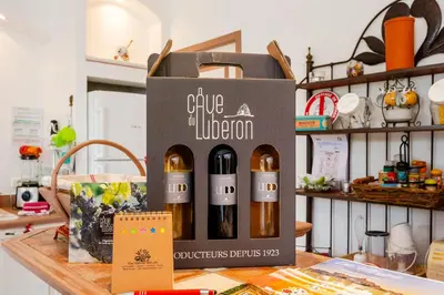 a box of wine on top of a table at Les gites de Bel-Air en Luberon in Les Taillades
