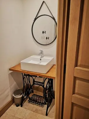 a bathroom with a sink and a mirror at Petit mas en Provence in Cornillon-Confoux