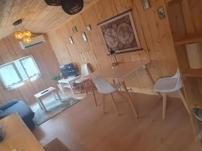 an overhead view of a room with a table and chairs at Chalet en provence