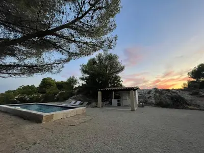 a pavilion with a pool and a picnic shelter at Luberon house with view in Cucuron