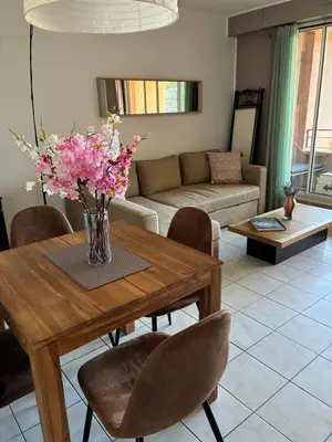 a kitchen with a refrigerator and a microwave at Calme T2, Wifi, Proche centre et sites culturels, Vue magnifique in Aix-en-Provence