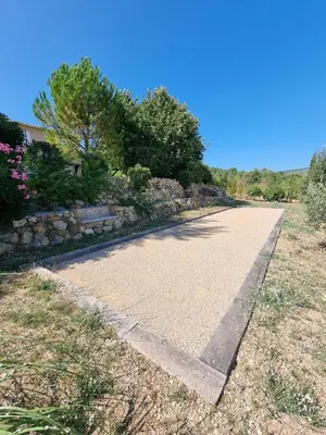 an empty road in the middle of a field at Gîtes de la Coupière Le Laurier in Aubenas-les-Alpes