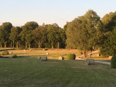 a field with hay bales in the grass at Domaine De Pradaous in Reillanne