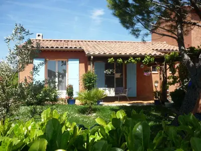a small house with a garden in front of it at Holiday Home by Interhome in Pierrevert