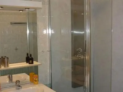 a bathroom with a shower and a sink at Holiday Home by Interhome in Pierrevert