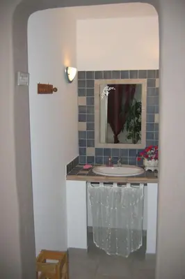 a bathroom with a sink and a mirror at Holiday Home Die Gîtes de Bel-Air im Luberon in der Provence by Interhome in Les Taillades