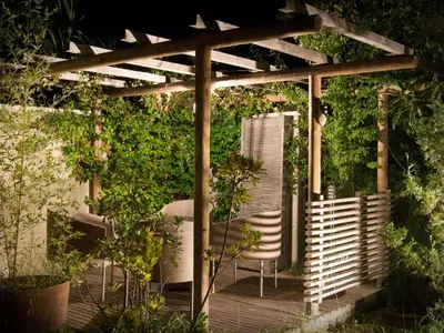 a wooden deck with a pergola with plants at Holiday Home Die Gîtes de Bel-Air im Luberon in der Provence by Interhome in Les Taillades