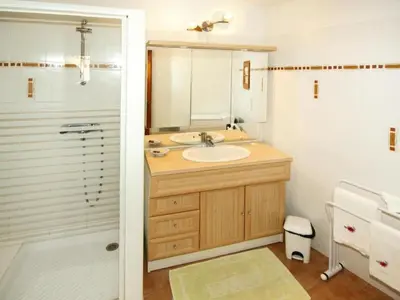 a bathroom with a sink and a shower at Apartment Morard - Bonnieux Appt 2- Etage by Interhome in Bonnieux