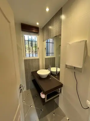 a bathroom with a sink and a mirror at T2 avec Terrasse à Ventabren proche Aix in Ventabren