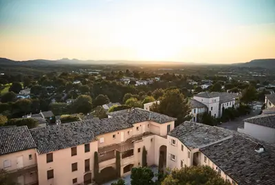an aerial view of a town with houses at Village Pont Royal en Provence - maeva Home - Appartement 2 pièces 5 personnes - Sélection MAE-1083 in Mallemort