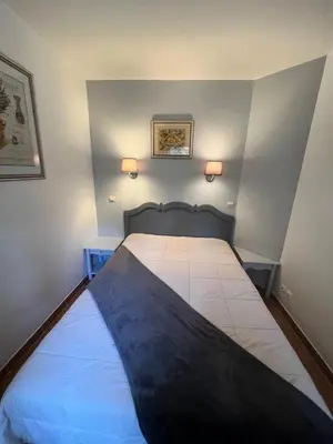 a bedroom with a large bed in a room at Village Pont Royal en Provence - maeva Home - Appartement 2 pièces 5 personnes - Sélection MAE-1083 in Mallemort