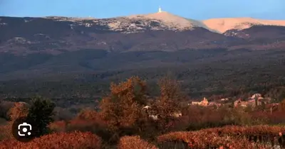 a view of a mountain range with snow capped mountains at Appartement cosy & calme avec parking privé & terrasse in Mazan