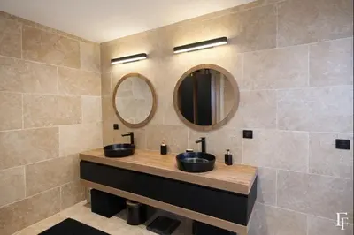 a bathroom with two sinks and a mirror at Villa Alberta Charming 10-person villa in Provence in Éguilles
