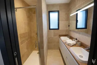 a bathroom with a shower and a sink and a toilet at Villa Alberta Charming 10-person villa in Provence in Éguilles