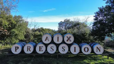 a sign for a park with a bunch of barrels at Tiny House Sainte Victoire - Brasserie Aix Pression in Rognes