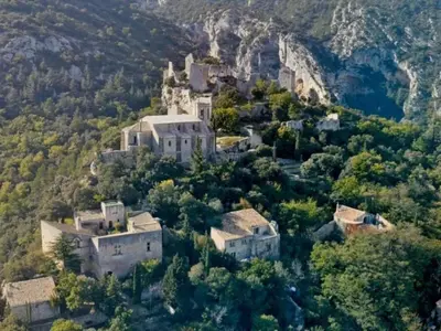 a village on the side of a mountain at Mobil-home confortable, 2 chambres, 4 personnes - API-1-52-1390 in Cavaillon