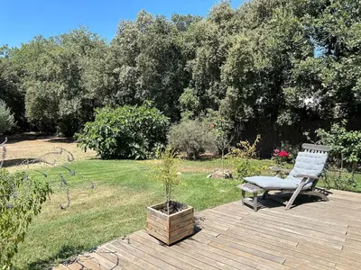 a small shed in a yard with green grass at -La Garrigue Paradis-Maison de Vacances entièrement climatisée 5 chambres avec piscine-10 personnes in Rognes