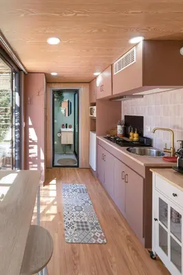 a kitchen with a sink and a counter top at Sous les étoiles du Luberon, Tiny House, Ménerbes in Ménerbes