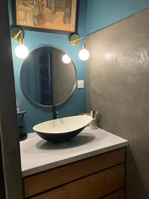 a bathroom with a bowl sink and a mirror at Charmant appartement velleron in Velleron