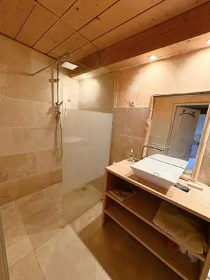 a bathroom with a sink and a shower at Le Mas des Poètes in Saint-Andiol