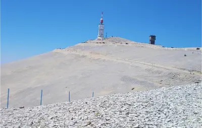 a hill with a lighthouse on top of it at Nice Home In Jonquerettes in Jonquerettes