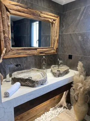 a bathroom with a sink and a mirror on a counter at Villa Luxury Lagoon - Aix en Provence in Ventabren