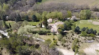 an aerial view of a house in a field at Le pré de la Chaumette in Pierrevert
