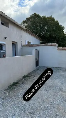 a skateboard laying on the ground in front of a building at Ideal Cyclistes Km0 Ventoux RDC cour parking in Bédoin