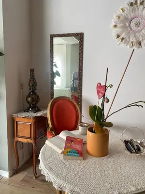 a room with a table with a mirror and a chair at Ideal festival d'Avignon in Monteux