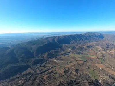 an aerial view of a city from an airplane at Jolie maison au coeur du Luberon in Saint-Martin-de-Castillon
