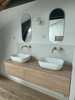 two sinks in a bathroom with two mirrors at Villa moderne tout confort in Salon-de-Provence