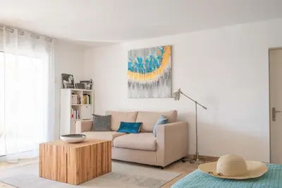 a living room with a couch and a coffee table at Mas Noves - Horizon Alpilles villa in Noves