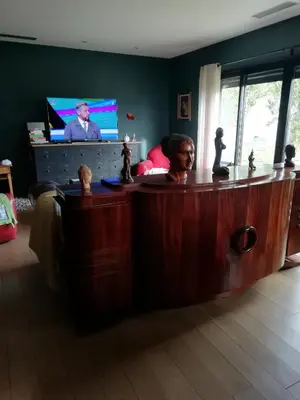 a living room with a wooden coffee table with a tv at Maison individuelle in Morières-lès-Avignon