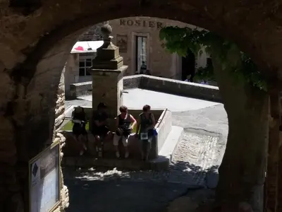 a bedroom with a bed with two pillows on it at Bastidon du Chene in Gordes