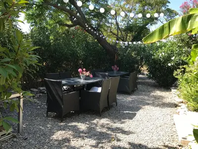 a living room with two couches and a fireplace at Les Esperelles in Lagnes